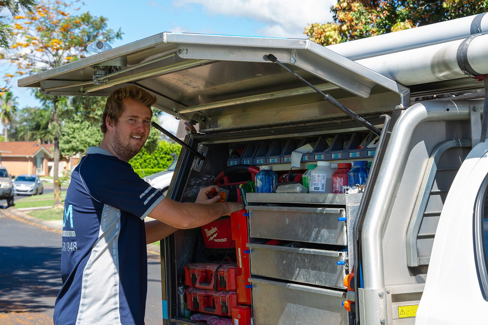 Aaron loading the AJM van