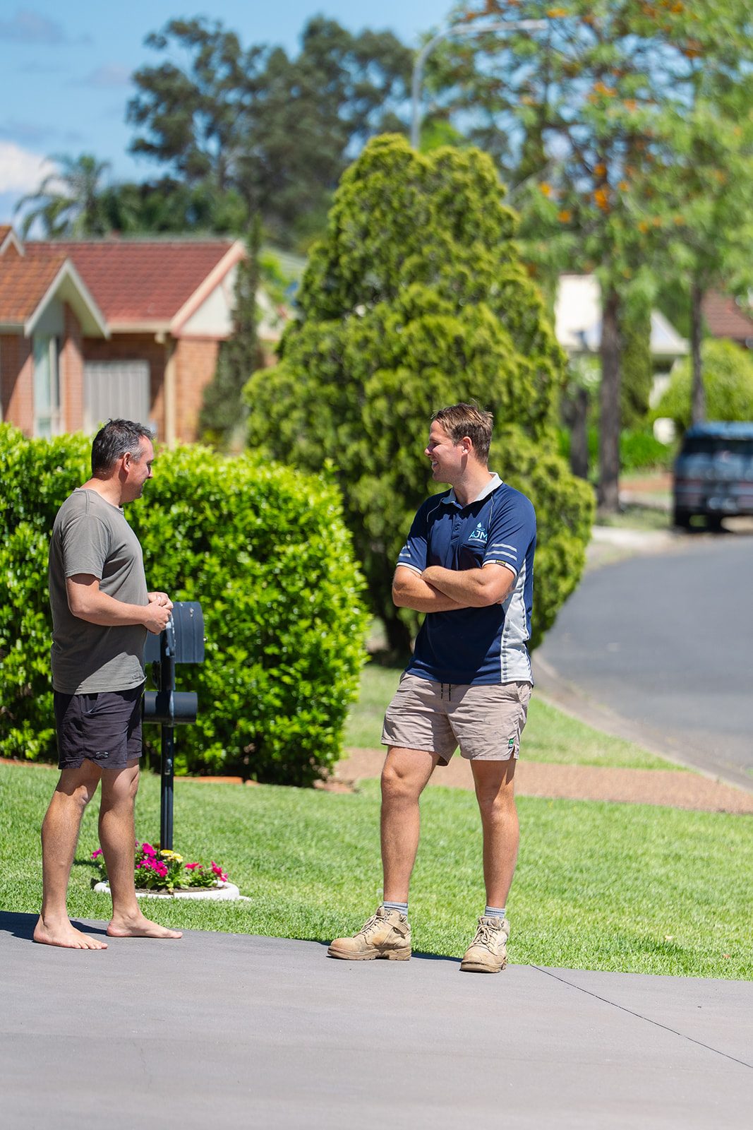 Aaron from AJM Plumbing Solutions talking a homeowner through the job