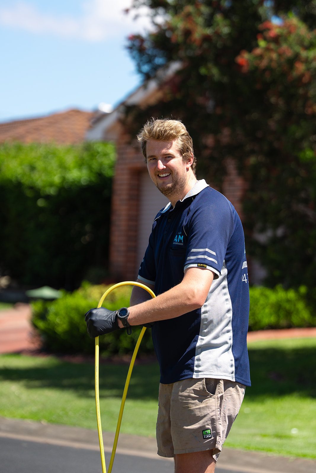 Aaron with the drain jetter hose