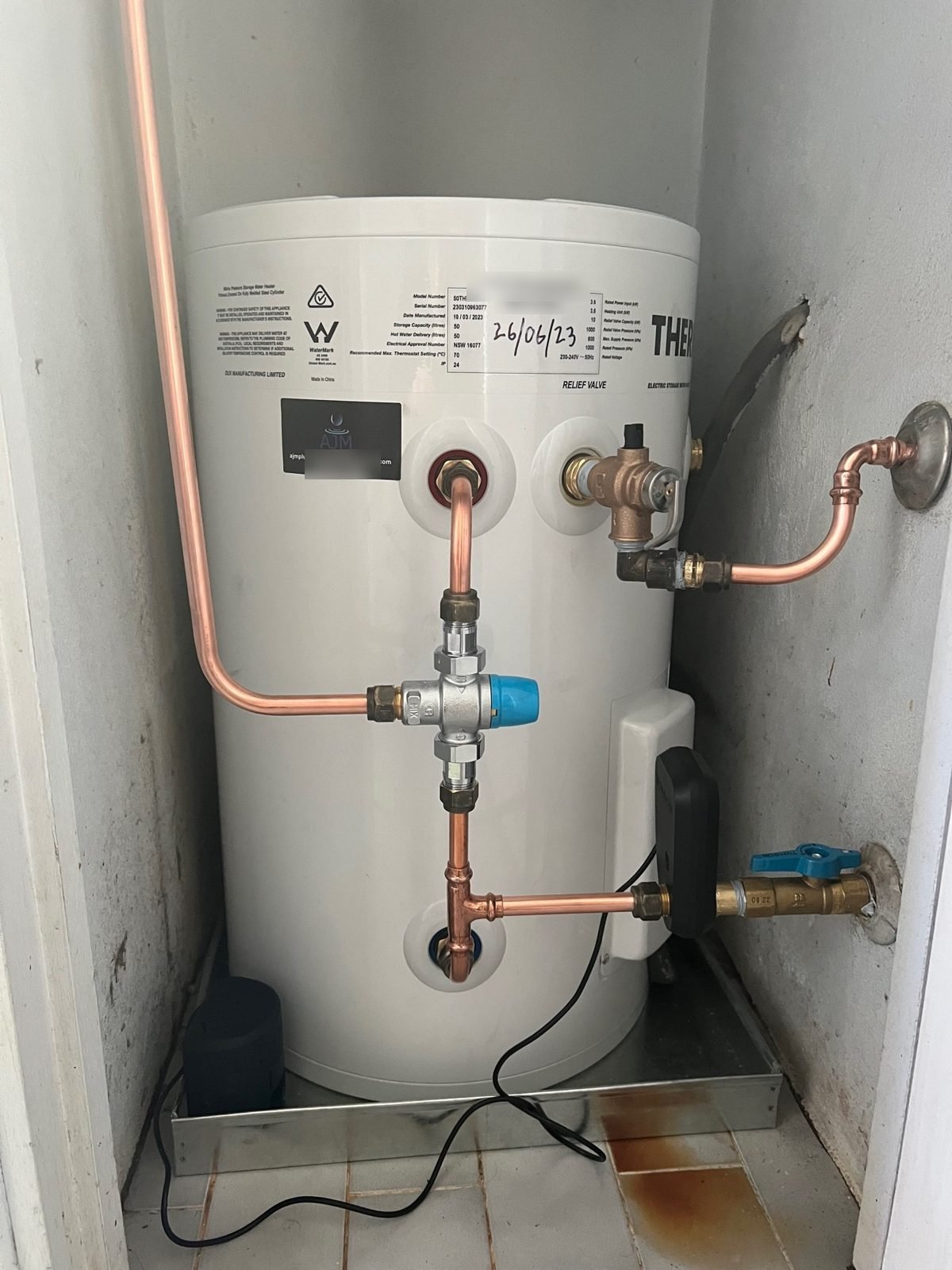 An electric hot water system installed by AJM Plumbing Solutions